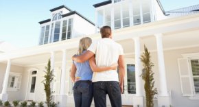 couple looking at nice house