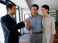 Couple receiving their house keys