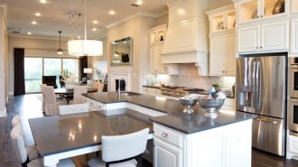 Design highlights include gourmet kitchens, spacious living areas, breakfast nooks, and master bedroom suites with luxury master bathrooms.